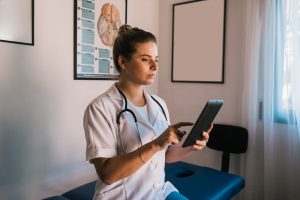 female doctor in office with tablet